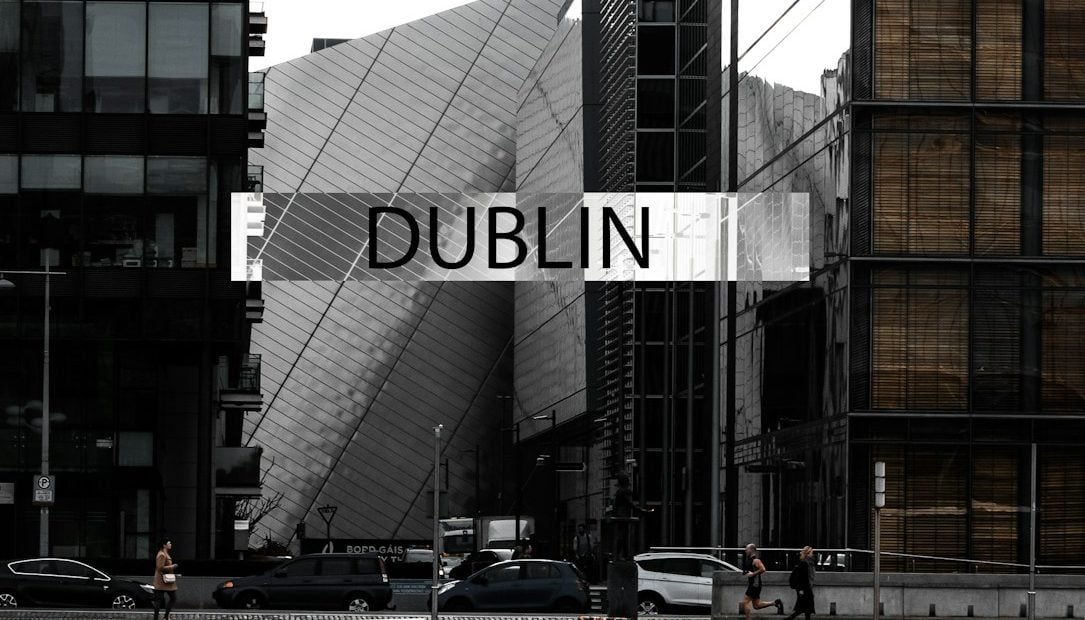 brown and gray building near body of water during daytime